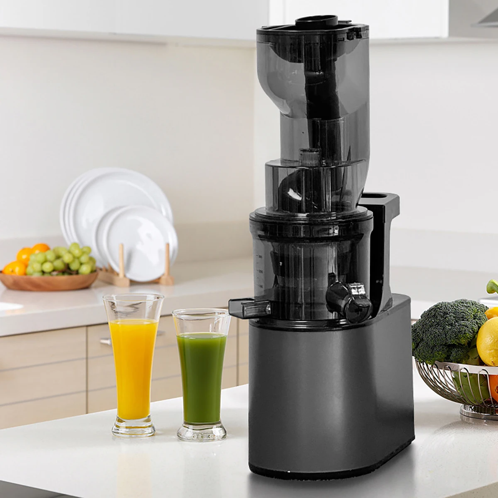 Premium Cold Press Slow Juicer - Side View with Grapefruit Juice